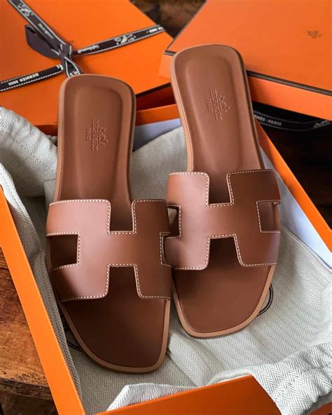 does hermes oran sandals run small|women wearing Hermes oran sandals.